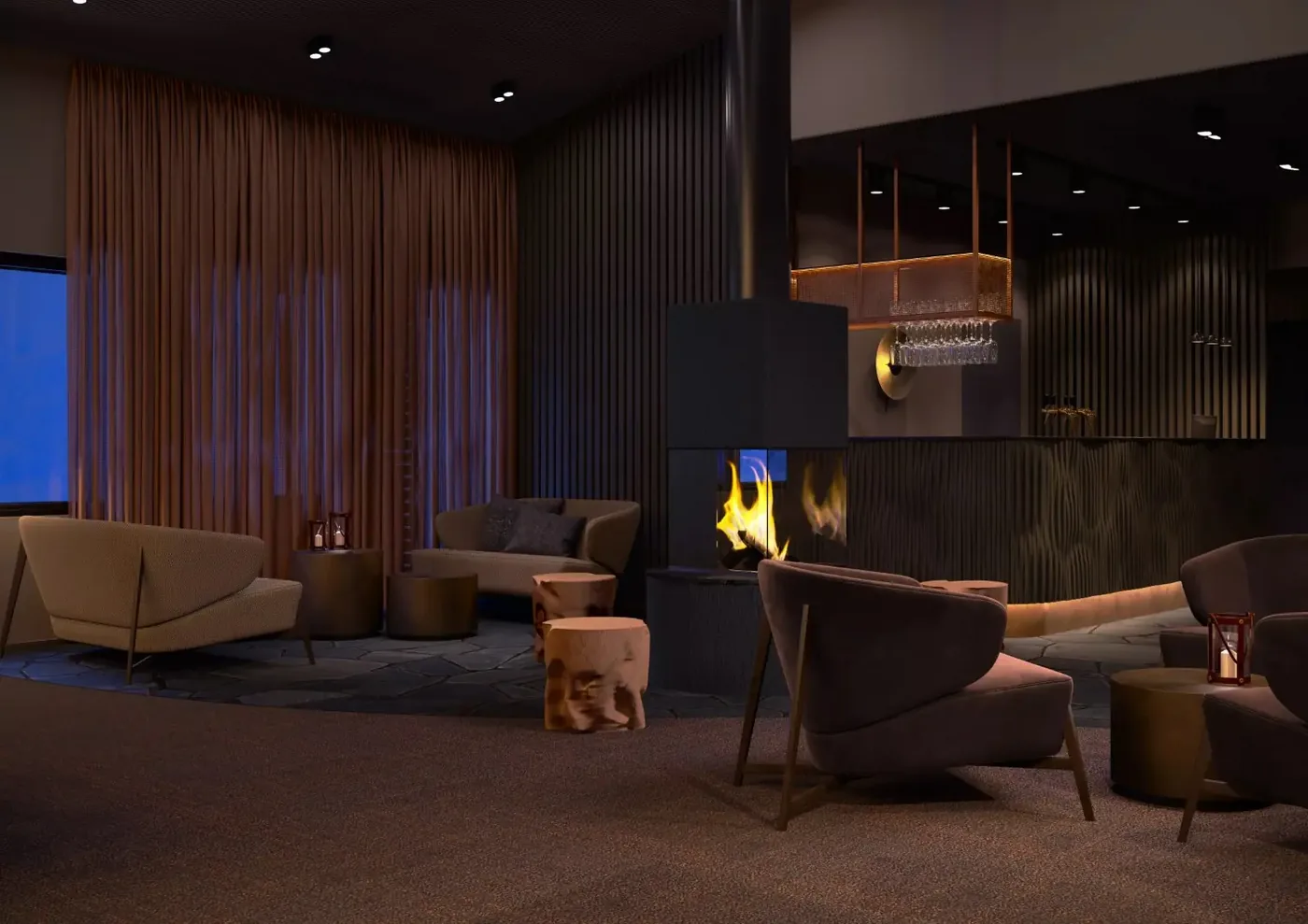 The lounge: armchairs and low sofas around a black suspended fireplace with a stone hearth, raw log stools, copper-toned curtains, and a lit bar with hanging glassware behind.