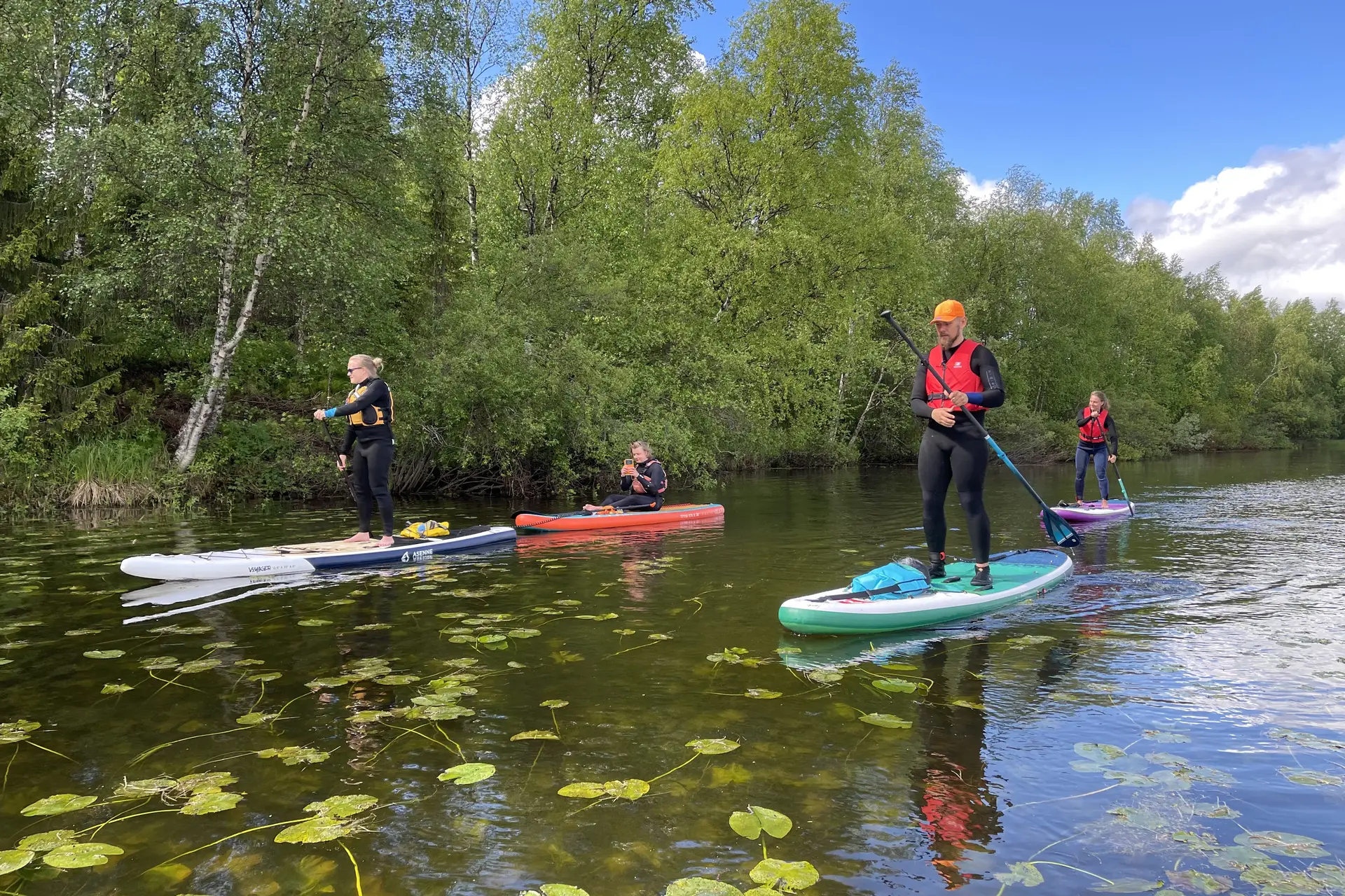 Family stand-up paddleboarding adventure